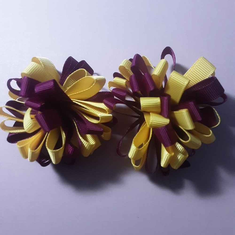 pair of dog bows, ear bows, collar bows, top knot bows, maroon and yelllow